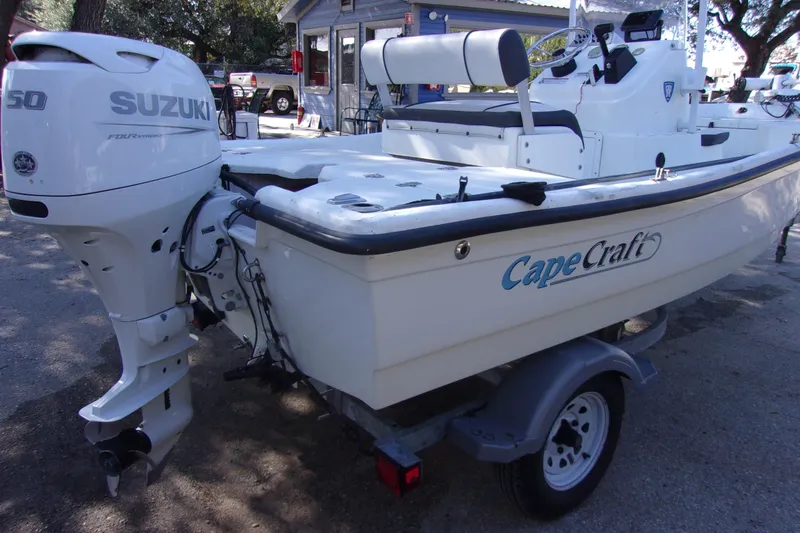 Slide: The Image of 2021 Clearwater Sport Fishing Cape Craft 166CC boat with Suzuki outboard motor on trailer. - 3