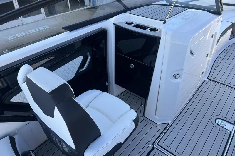 Slide: The Image of 2025 Yamaha Boats 252SE interior with sleek seating and modern design. - 11