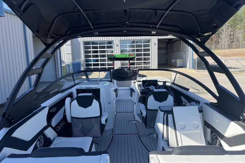 Slide: The Image of 2025 Yamaha Boats 252SE interior with sleek seating and modern design. - 7