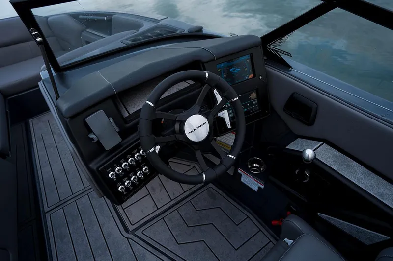 Slide: The Image of Manufacturer Provided Image: 2026 Moomba Craz boat dashboard with steering wheel and control panel. - 5