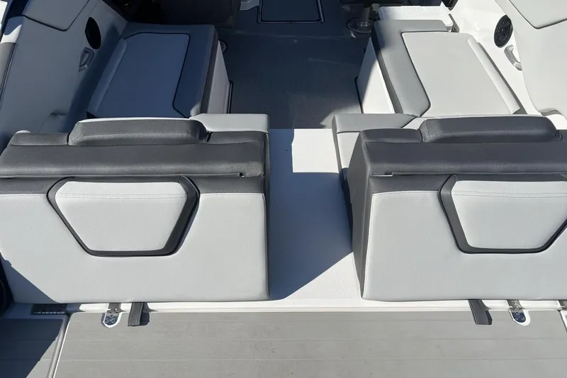 Slide: The Image of 2025 Yamaha Boats AR250 interior seating with modern design and comfortable upholstery. - 11