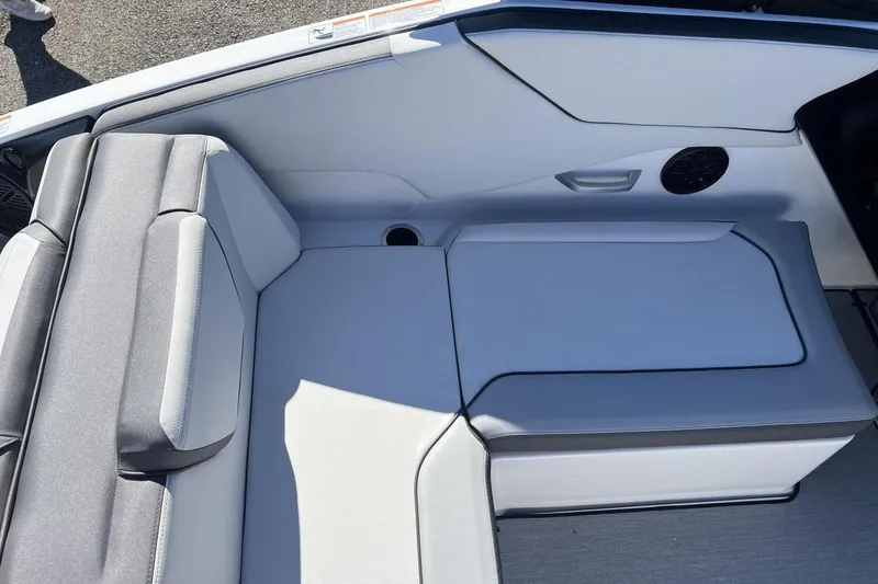 Slide: The Image of 2025 Yamaha Boats AR250 interior seating with sleek, modern design and comfortable upholstery. - 14