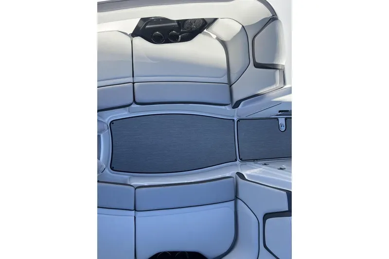 Slide: The Image of 2025 Yamaha Boats AR250 interior seating with sleek, modern design and premium materials. - 23