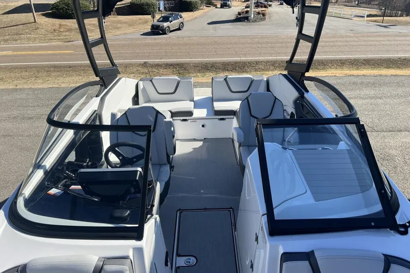 Slide: The Image of 2025 Yamaha Boats AR250 interior with sleek seating and modern design. - 25