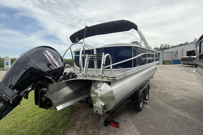 Slide: The Image of 2025 Barletta ARIA 22QC pontoon boat with Mercury outboard motor on trailer. - 10