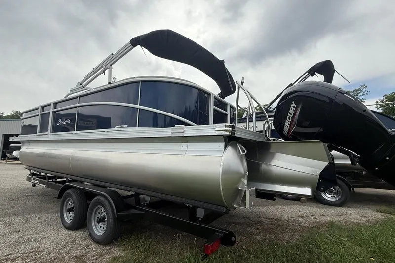 Slide: The Image of 2025 Barletta ARIA 22QC pontoon boat with Mercury engine on trailer. - 12