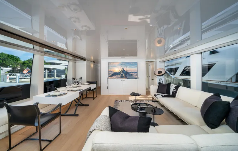 Slide: The Image of Luxurious interior of 2022 Sanlorenzo SL96A yacht with modern furnishings and large windows. - 10