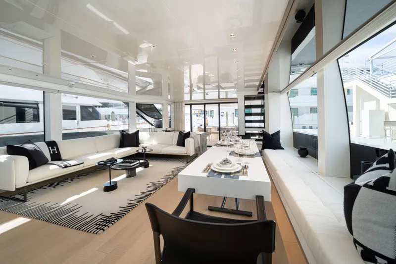 Slide: The Image of Luxurious interior of 2022 Sanlorenzo SL96A yacht with elegant dining and seating areas. - 12