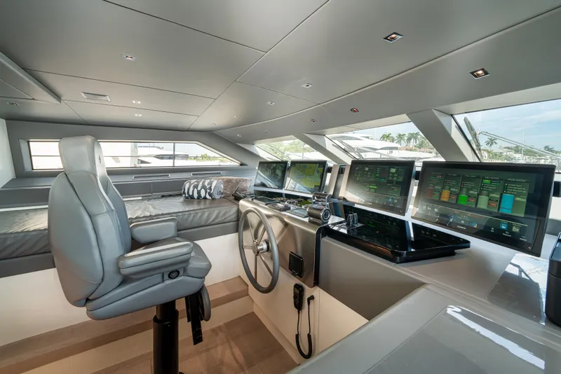 Slide: The Image of Luxurious 2022 Sanlorenzo SL96A yacht helm with modern navigation technology and sleek design. - 13