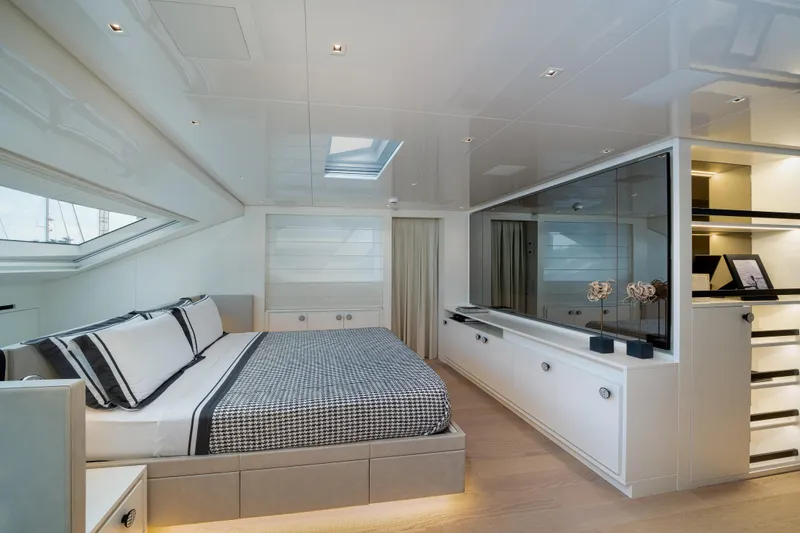 Slide: The Image of Luxurious bedroom interior of 2022 Sanlorenzo SL96A yacht, featuring modern design and elegant furnishings. - 17