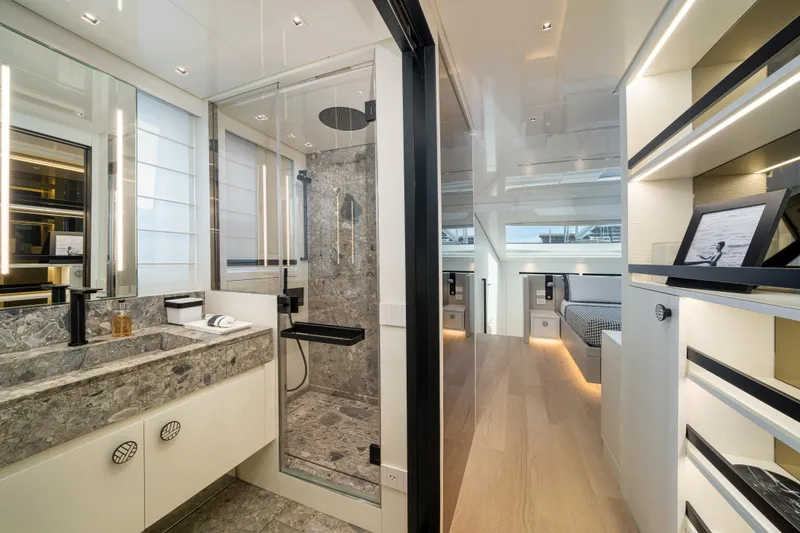 Slide: The Image of Luxurious interior of 2022 Sanlorenzo SL96A yacht featuring modern bathroom and hallway design. - 18