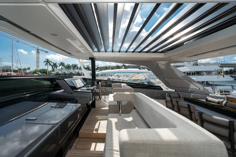 Slide: The Image of Luxurious 2022 Sanlorenzo SL96A yacht interior with modern design and open sky view. - 2