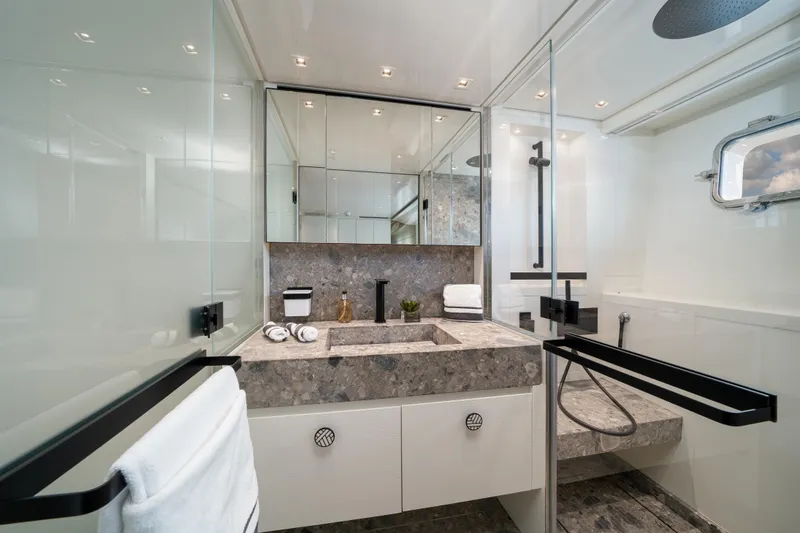Slide: The Image of Luxurious bathroom in 2022 Sanlorenzo SL96A yacht with modern fixtures and elegant design. - 21