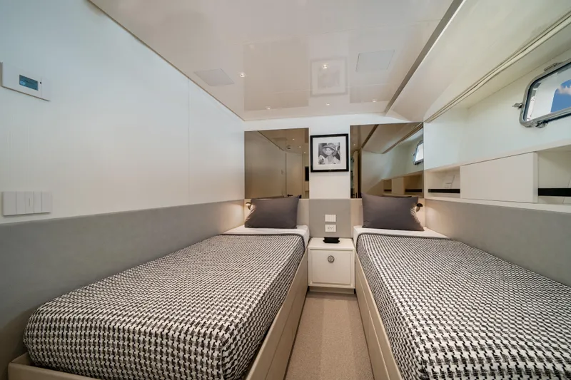 Slide: The Image of Twin bed cabin in 2022 Sanlorenzo SL96A yacht, featuring modern decor and ample lighting. - 23