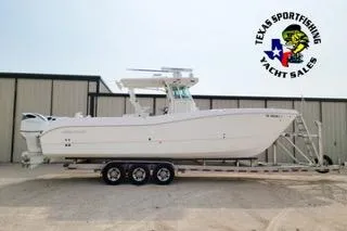 The Image of 2021 World Cat 325 CC boat on trailer at Texas Sportfishing Yacht Sales. - 0
