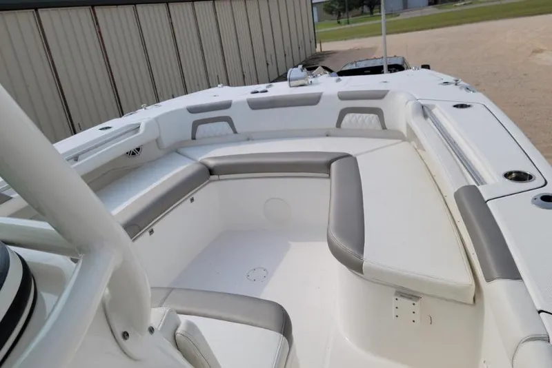 Slide: The Image of Storage compartment in 2021 World Cat 325 CC boat with life vests and accessories. - 11
