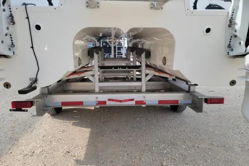 Slide: The Image of 2021 World Cat 325 CC boat with dual Suzuki engines and comfortable seating. - 5