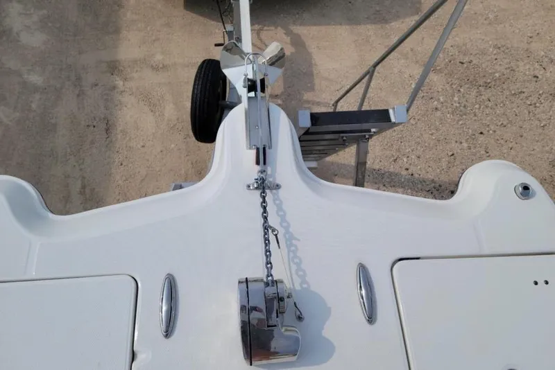 Slide: The Image of 2021 World Cat 325 CC boat, top view, showcasing sleek design and spacious deck. - 8