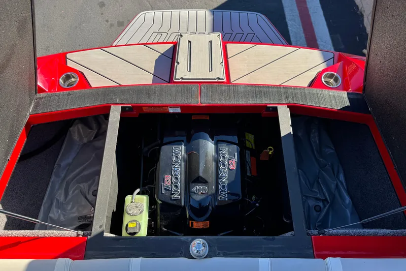Slide: The Image of 2018 Malibu Wakesetter 21 MLX engine compartment with Monsoon 6.2L engine. - 21