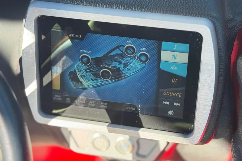 Slide: The Image of Touchscreen display in 2018 Malibu Wakesetter 21 MLX boat showing settings and controls. - 34