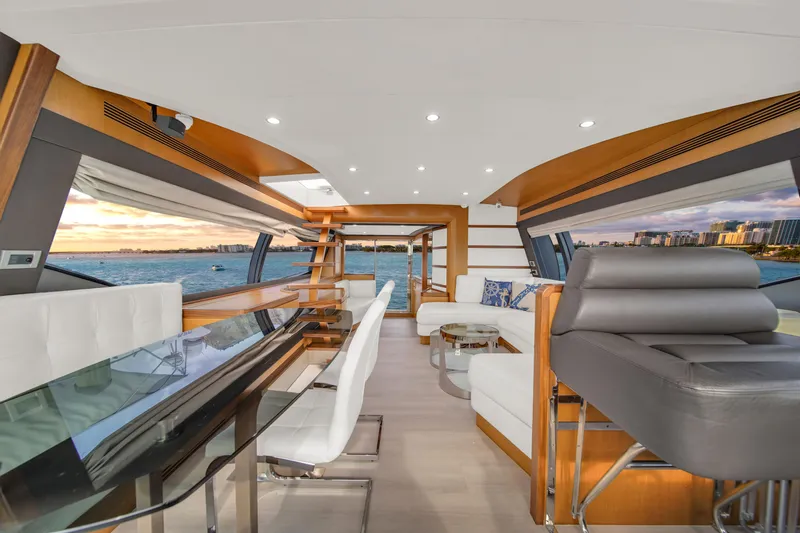 Slide: The Image of Luxurious interior of 2011 Ferretti Yachts 660 with modern furnishings and ocean view. - 13