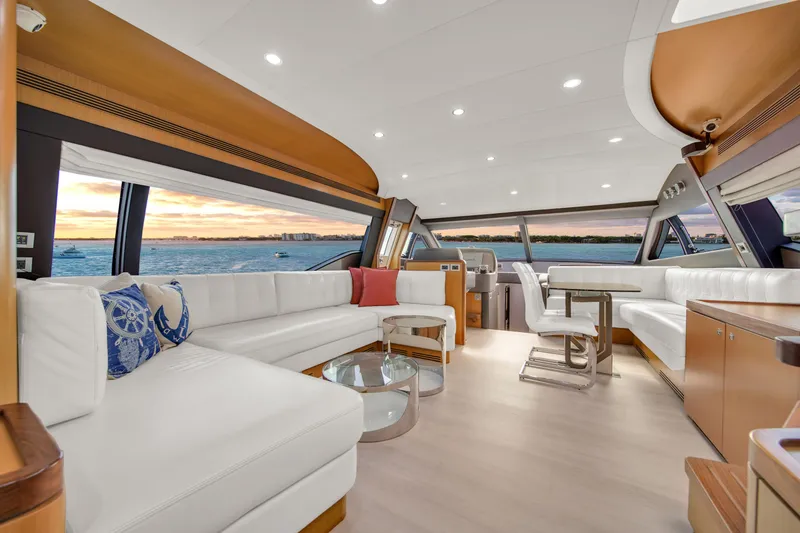 Slide: The Image of Luxurious interior of 2011 Ferretti Yachts 660 with elegant seating and panoramic windows. - 14