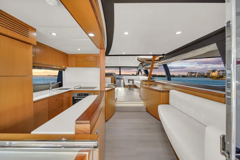 Slide: The Image of Luxurious interior of 2011 Ferretti Yachts 660 with modern kitchen and seating area. - 15