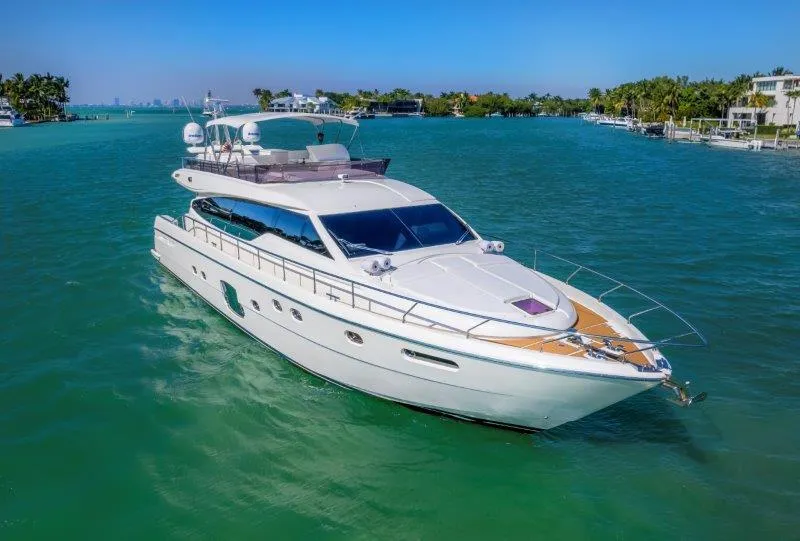 Slide: The Image of 2011 Ferretti Yachts 660 cruising on clear blue waters. - 3
