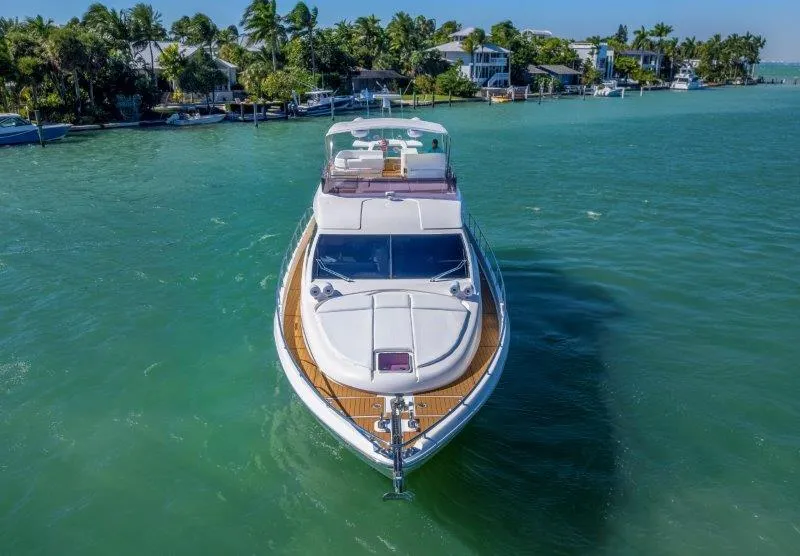 Slide: The Image of 2011 Ferretti Yachts 660 cruising in a scenic tropical waterway. - 4