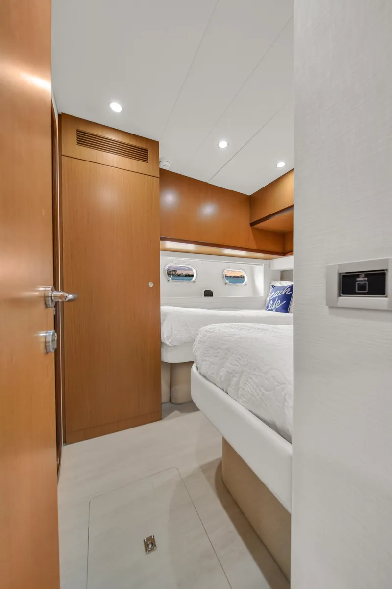 Slide: The Image of Luxurious cabin interior of 2011 Ferretti Yachts 660 with modern wood finishes. - 48