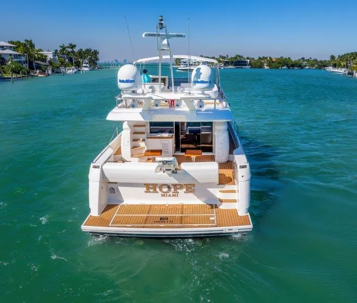 Slide: The Image of Ferretti Yachts 660, 2011 model, cruising in clear blue waters. - 8