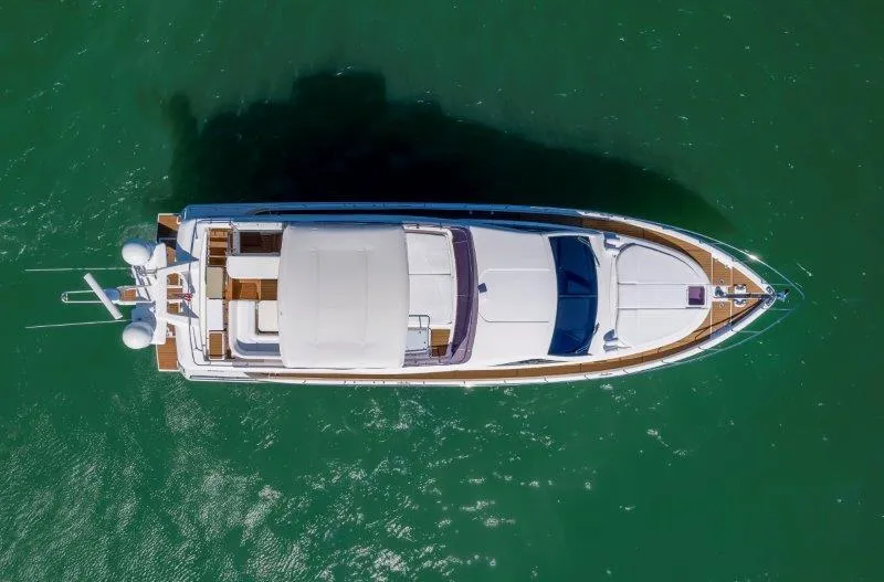 Slide: The Image of Aerial view of 2011 Ferretti Yachts 660 on green water. - 9
