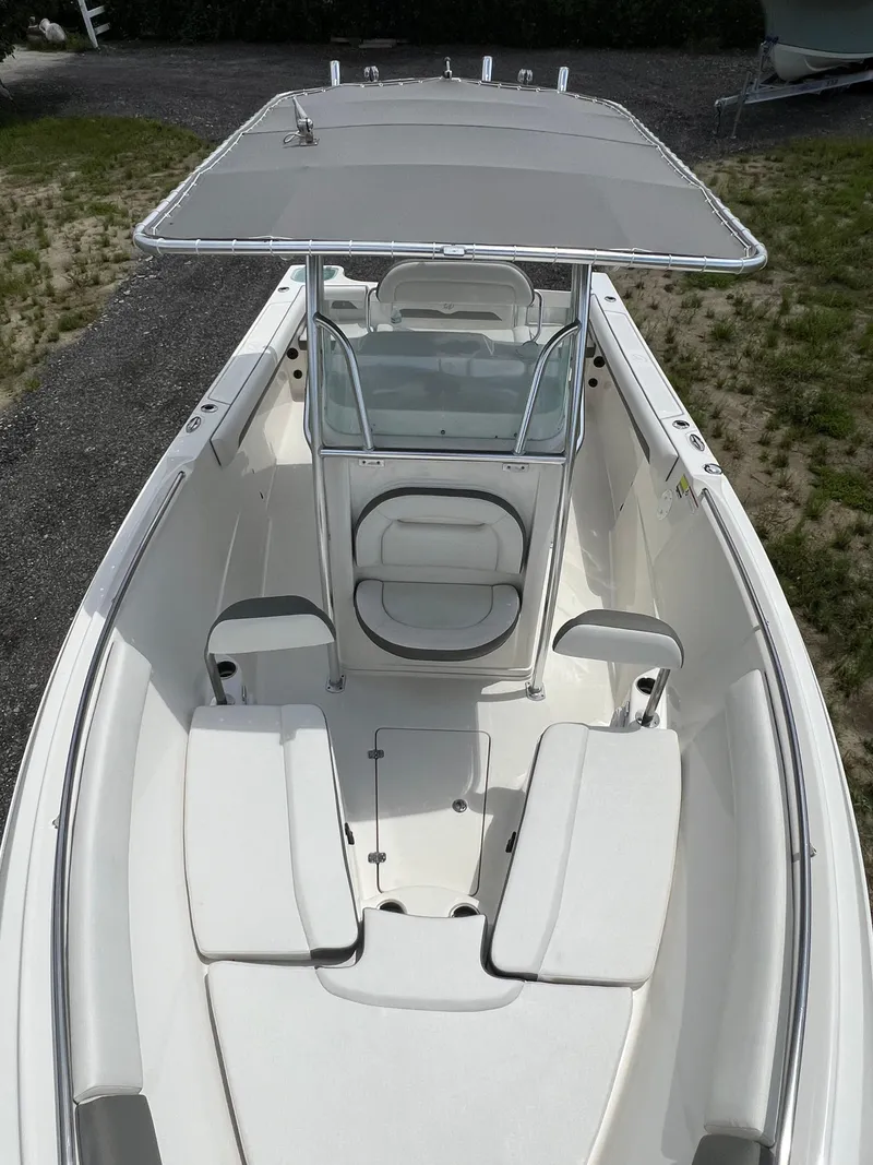 Slide: The Image of 2021 Sailfish 242 CC boat with spacious deck and seating. - 28