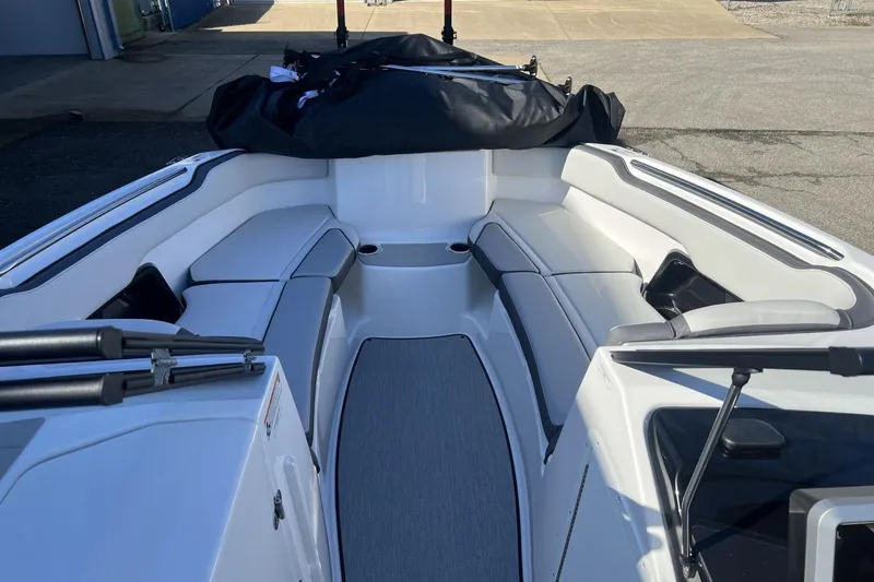 Slide: The Image of 2025 Yamaha Boats AR250 interior with sleek seating and modern design. - 18