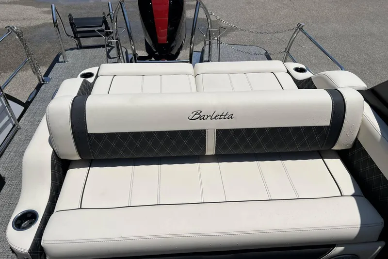Slide: The Image of 2026 Barletta L25UCA boat with luxurious white and black seating. - 8