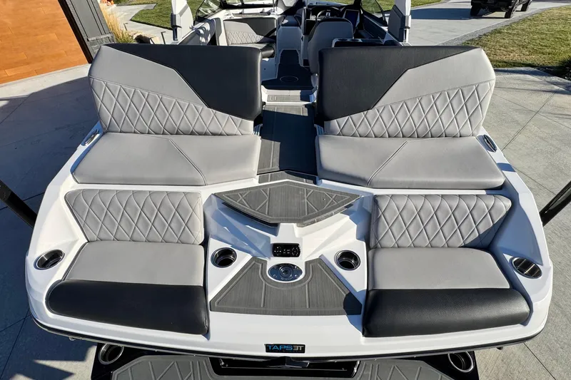 Slide: The Image of 2021 Tigé Z3 boat interior with stylish gray and black seating, featuring diamond stitching. - 10