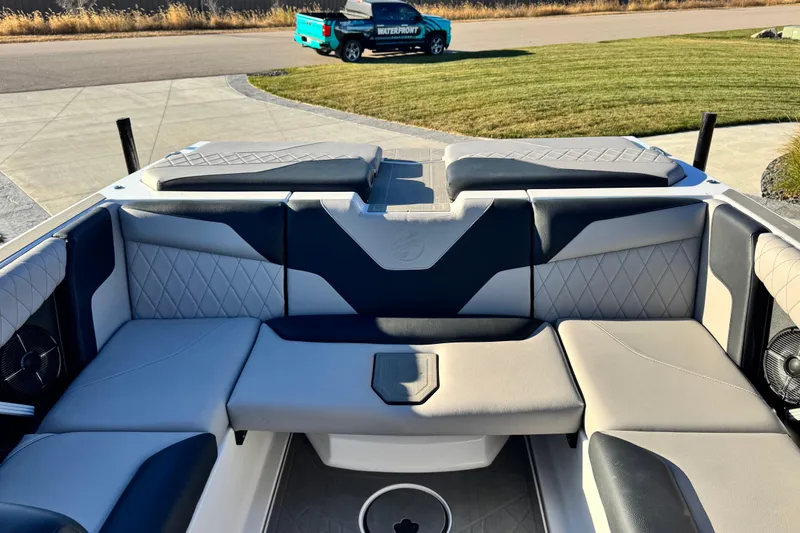 Slide: The Image of 2021 Tigé Z3 boat interior with luxurious seating and modern design. - 13