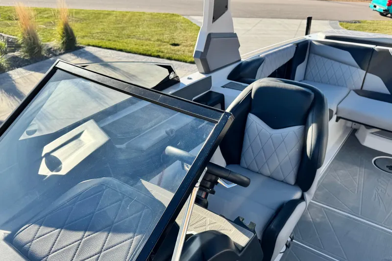 Slide: The Image of 2021 Tigé Z3 boat interior with sleek seating and modern dashboard design. - 17