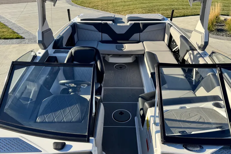 Slide: The Image of 2021 Tigé Z3 boat interior with modern seating and sleek design. - 21