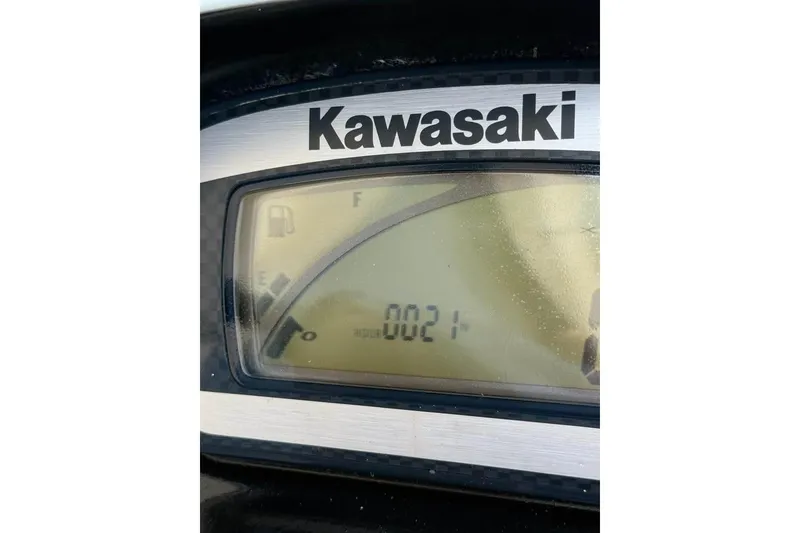 Slide: The Image of Dashboard of a 2013 Kawasaki STX15F showing fuel gauge and odometer reading. - 6