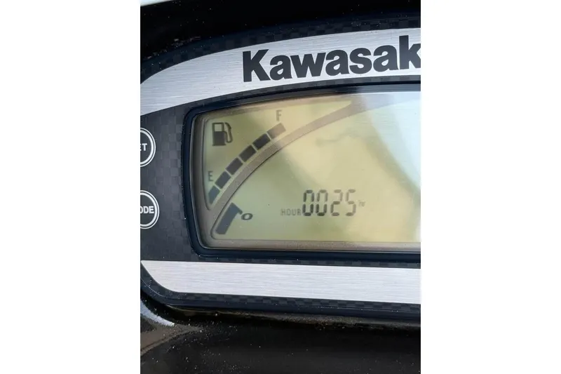 Slide: The Image of Kawasaki STX15F 2013 dashboard showing fuel gauge and 25 hours usage. - 7
