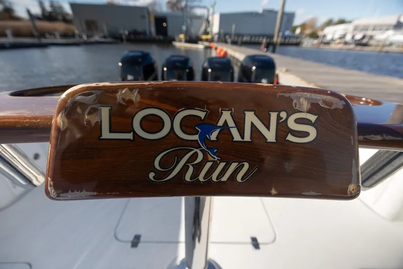 Slide: The Image of 2018 Yellowfin 39 Offshore boat with "Logan's Run" nameplate at dock. - 10