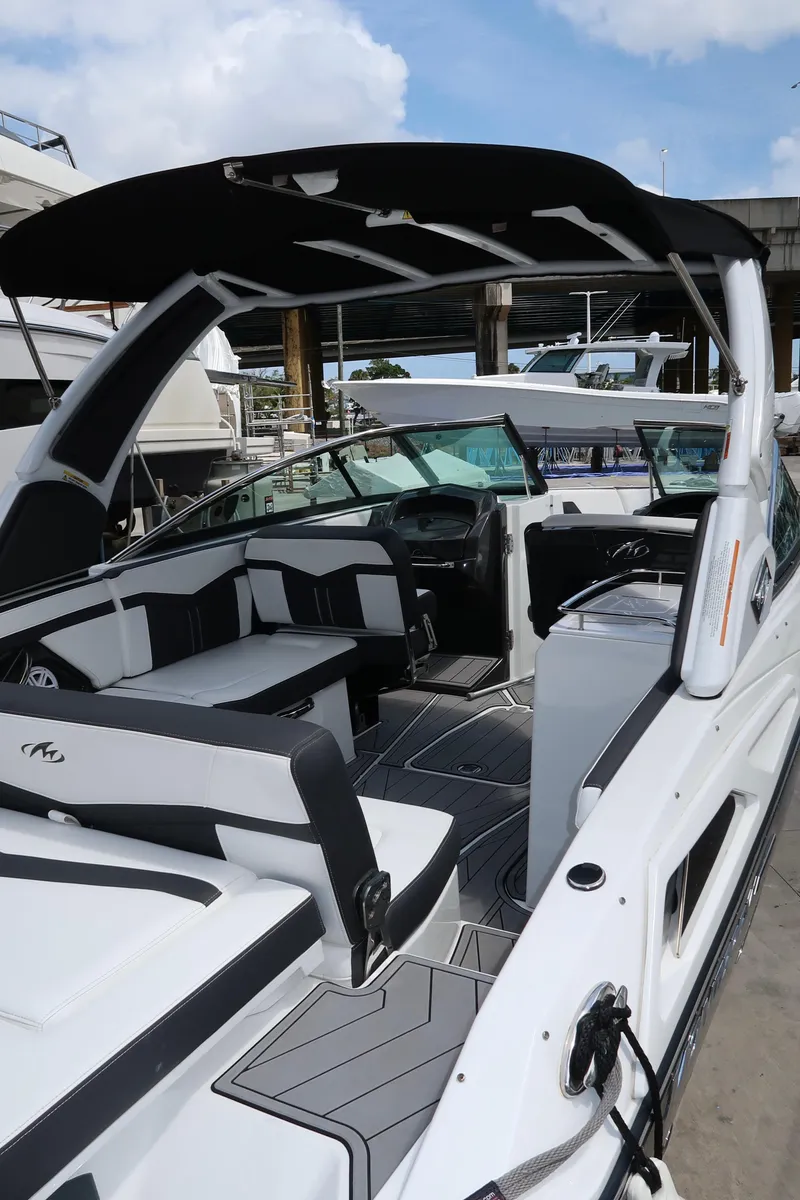Slide: The Image of 2022 Monterey 275 Super Sport boat with sleek interior and modern design. - 21