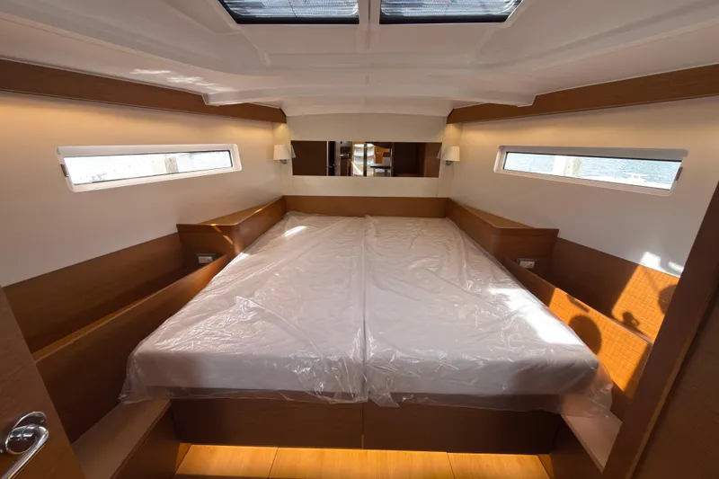 Slide: The Image of Luxurious cabin interior of 2025 Jeanneau Sun Odyssey 440 yacht, featuring modern design. - 31