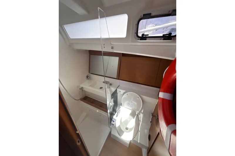 Slide: The Image of Modern bathroom in 2025 Jeanneau Sun Odyssey 440 yacht, featuring sleek design and compact amenities. - 32