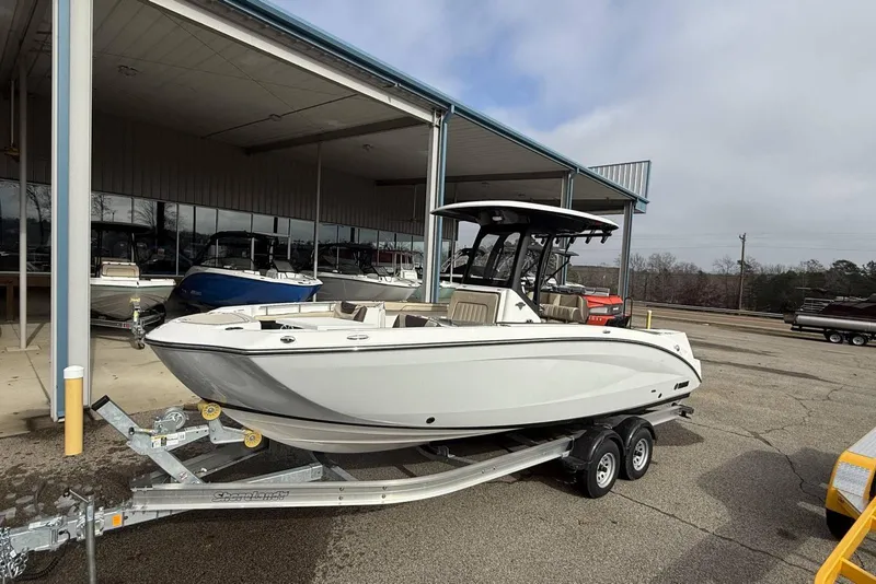 Slide: The Image of 2024 Yamaha Boats 255 FSH Sport E on trailer at dealership. - 28