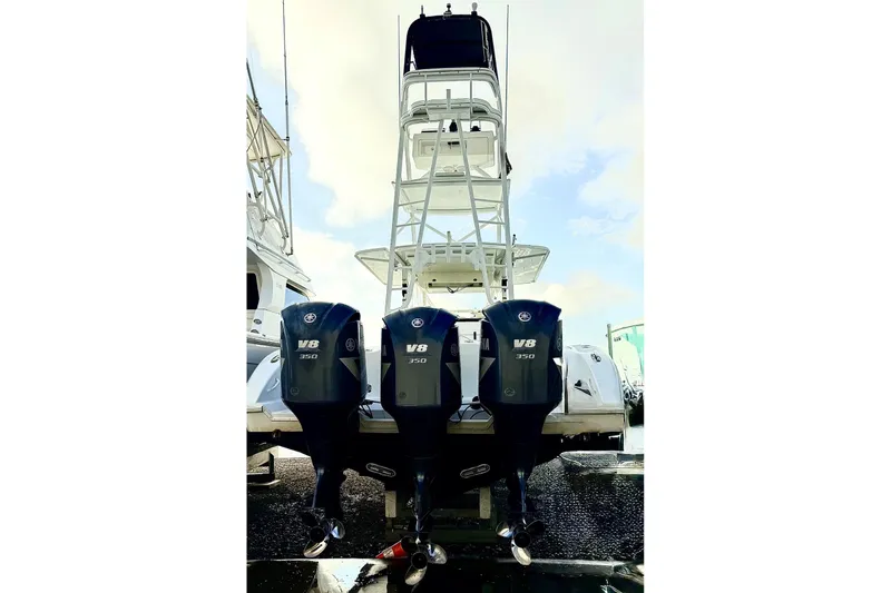 Slide: The Image of 2011 Yellowfin 42 Offshore boat with triple Yamaha V8 350 engines. - 21