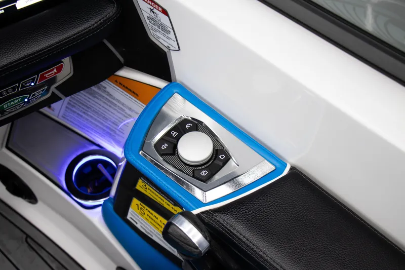 Slide: The Image of 2018 Nautique Super Air Nautique GS22 control panel with illuminated cup holder. - 9