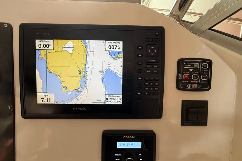Slide: The Image of 2005 Seaswirl Striper 290 boat dashboard with Garmin GPS navigation system. - 22