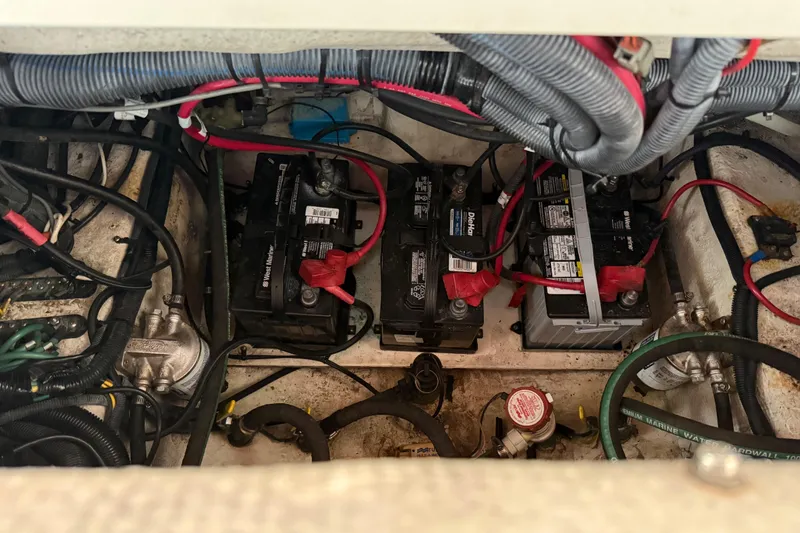 Slide: The Image of 2005 Seaswirl Striper 290 boat battery compartment with wiring and components. - 36